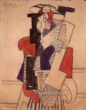 パブロ・ピカソ Painting - 肘掛け椅子に帽子をかぶった女性 1915年 パブロ・ピカソ